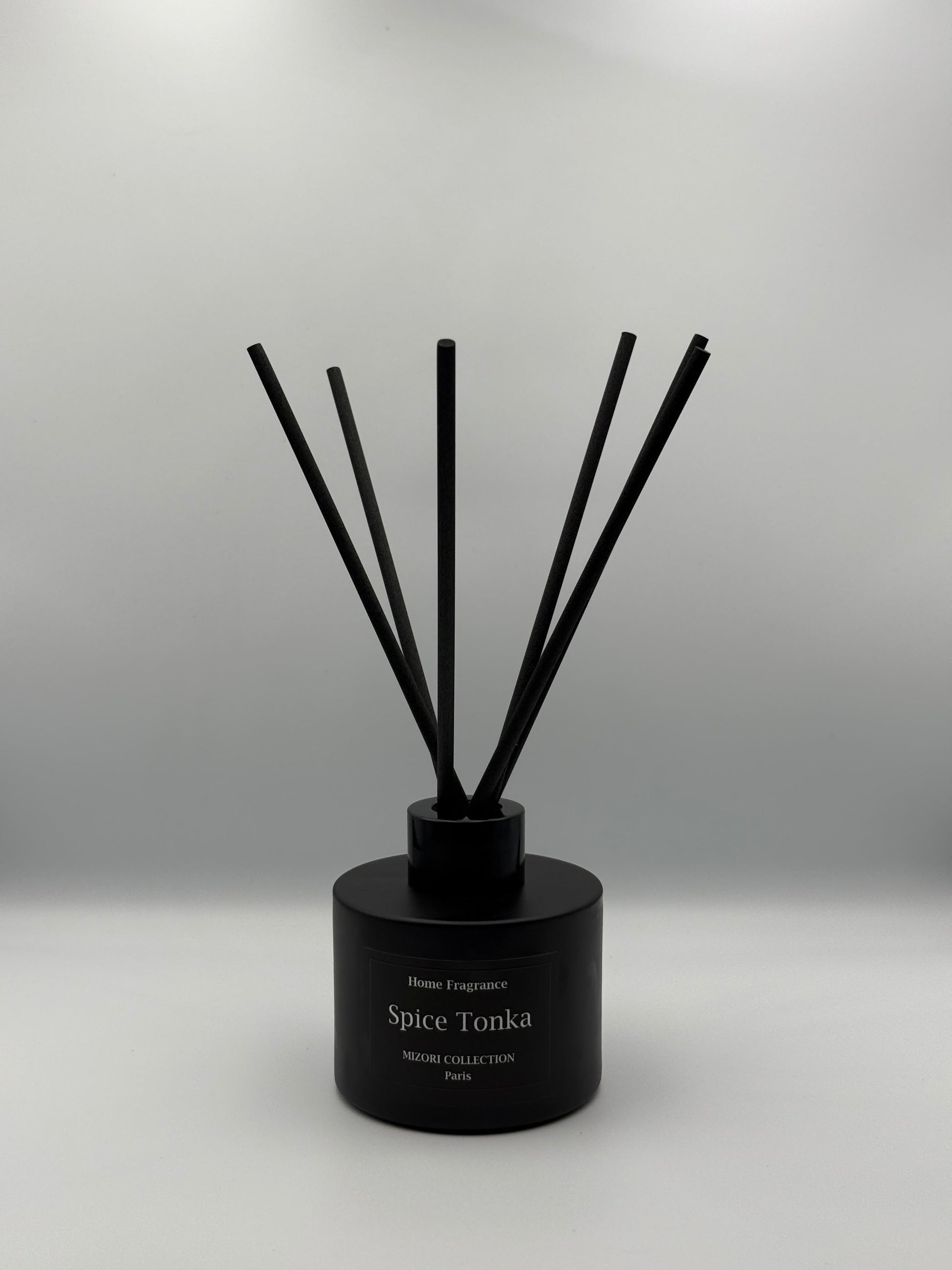Mizori Collection Paris Spice Tonka luxurious home fragrance sticks, elegant diffuser adding warm, aromatic scent to any room.