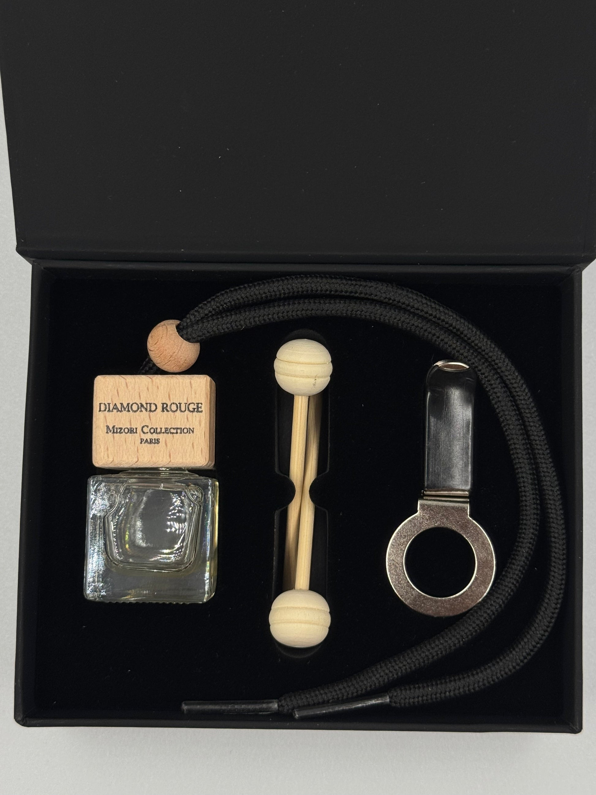Diamond Rouge Mizori Collection Paris car perfume in a gift box with fragrance sticks, luxury automotive air freshener.