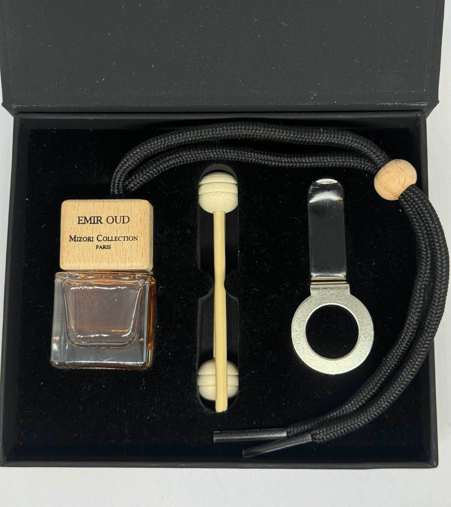 Mizori Collection Paris Emir Oud car perfume in black with hanging cord, luxury automotive fragrance in elegant packaging