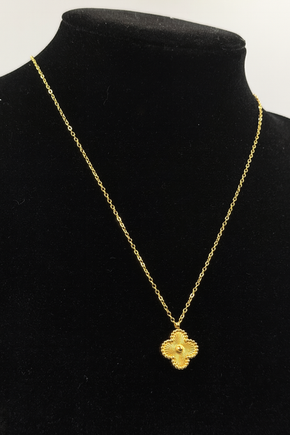 mizori_jewelry_stainless_steel_gold_clover_necklace_13mm_on_stand