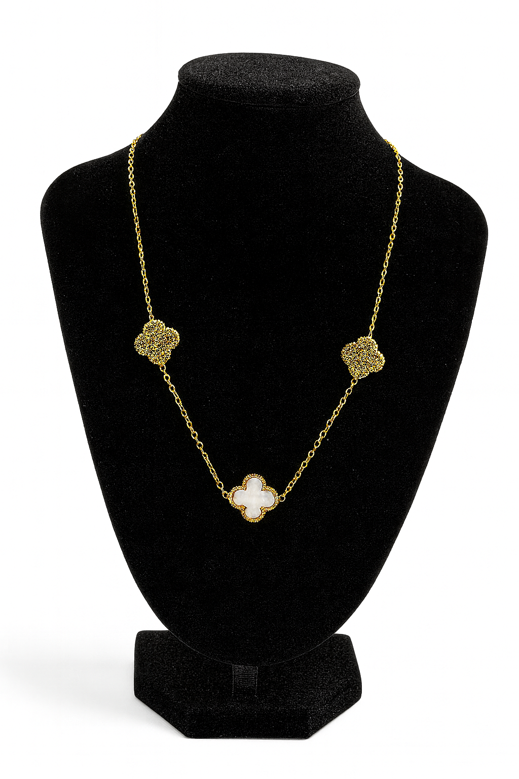 Mizori Jewelry stainless steel gold necklace with 13mm white clover and crystal clovers displayed on stand – water resistant, elegant design.