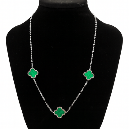 Mizori Jewelry stainless steel silver necklace with three 13mm green clovers displayed on stand