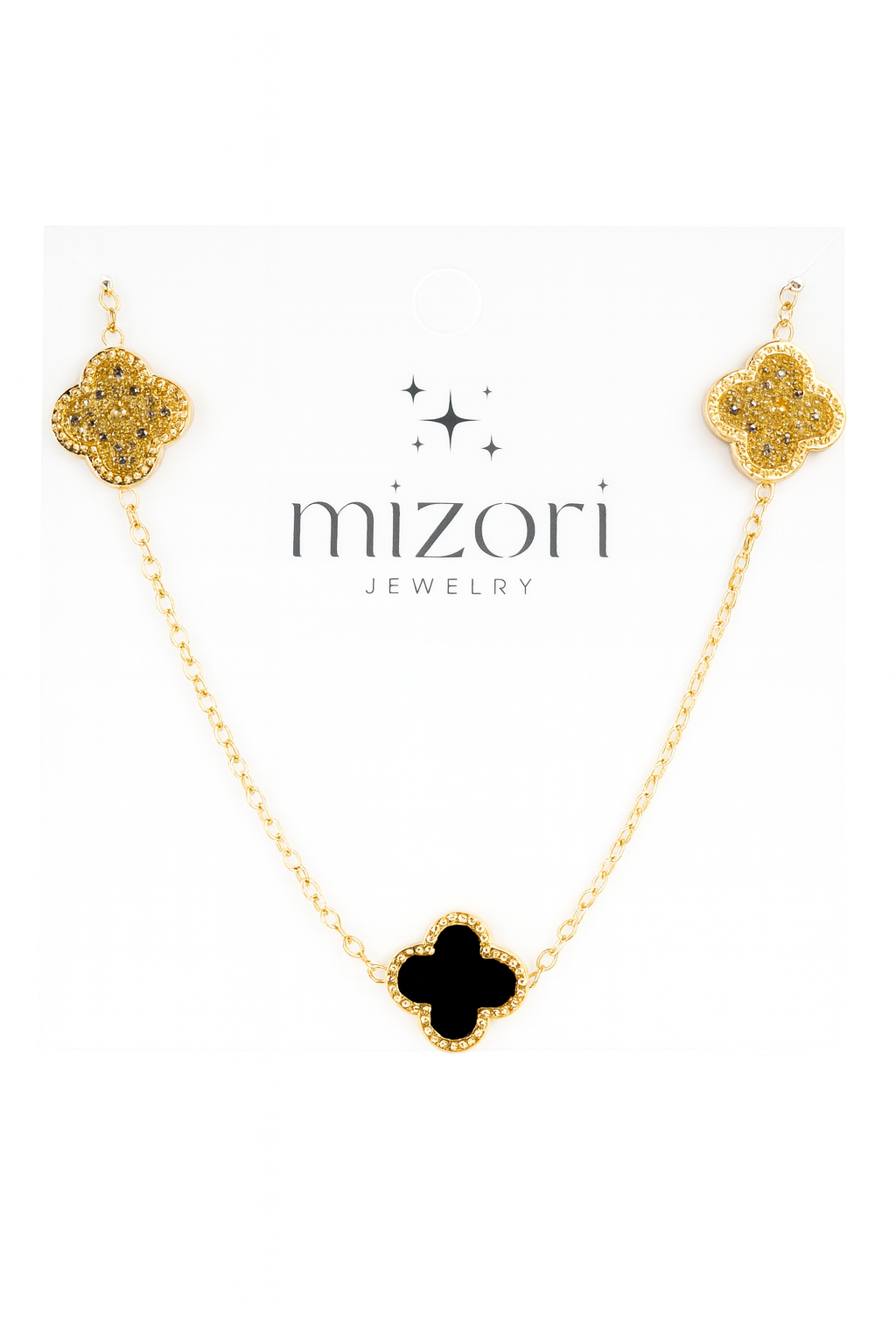 Mizori Jewelry stainless steel gold necklace with two crystal clovers and one 13mm black clover pendant, water-resistant and tarnish-free.