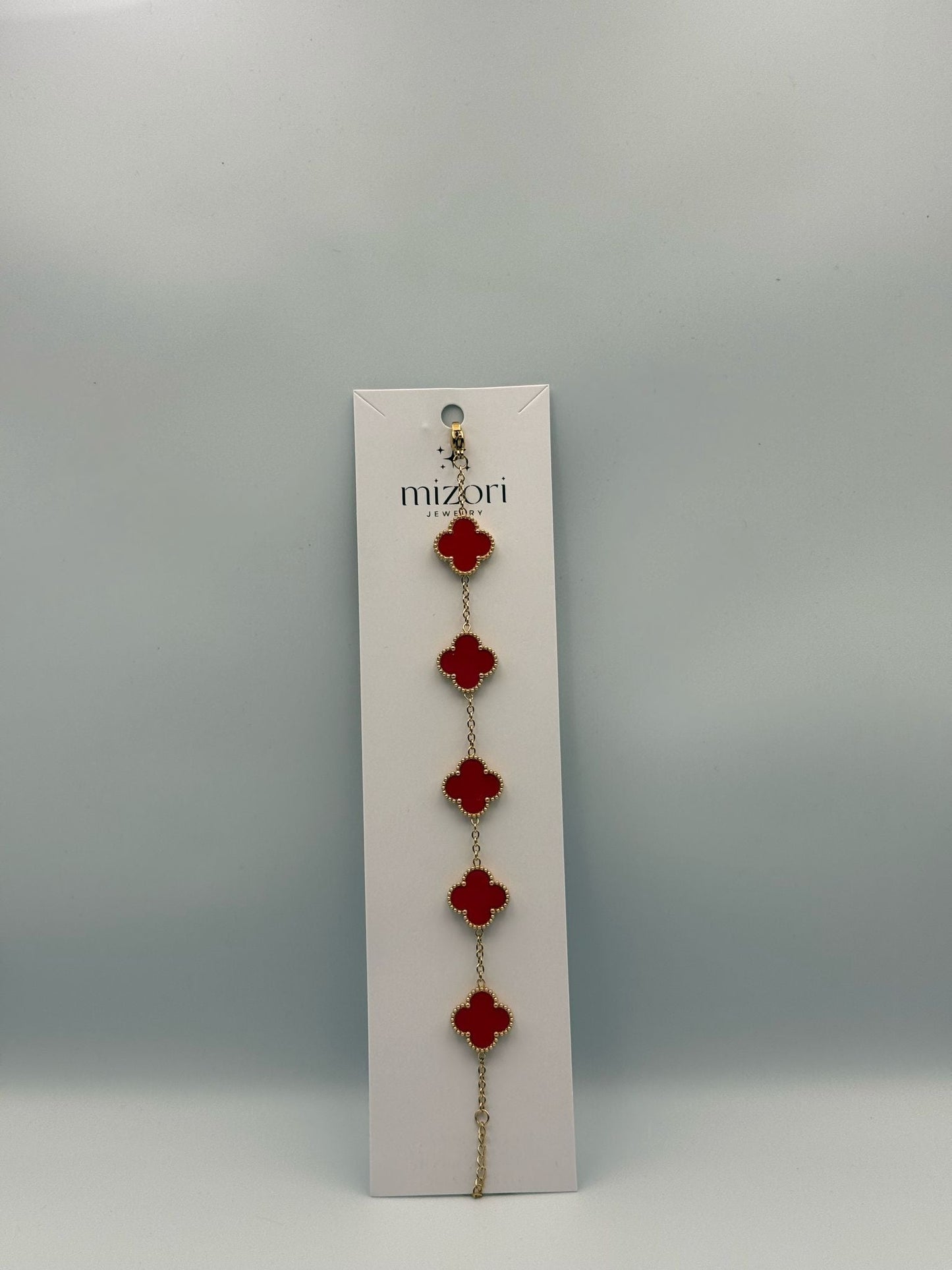 Mizori Jewelry red and gold stainless steel clover bracelet, elegant minimalist women’s fashion accessory