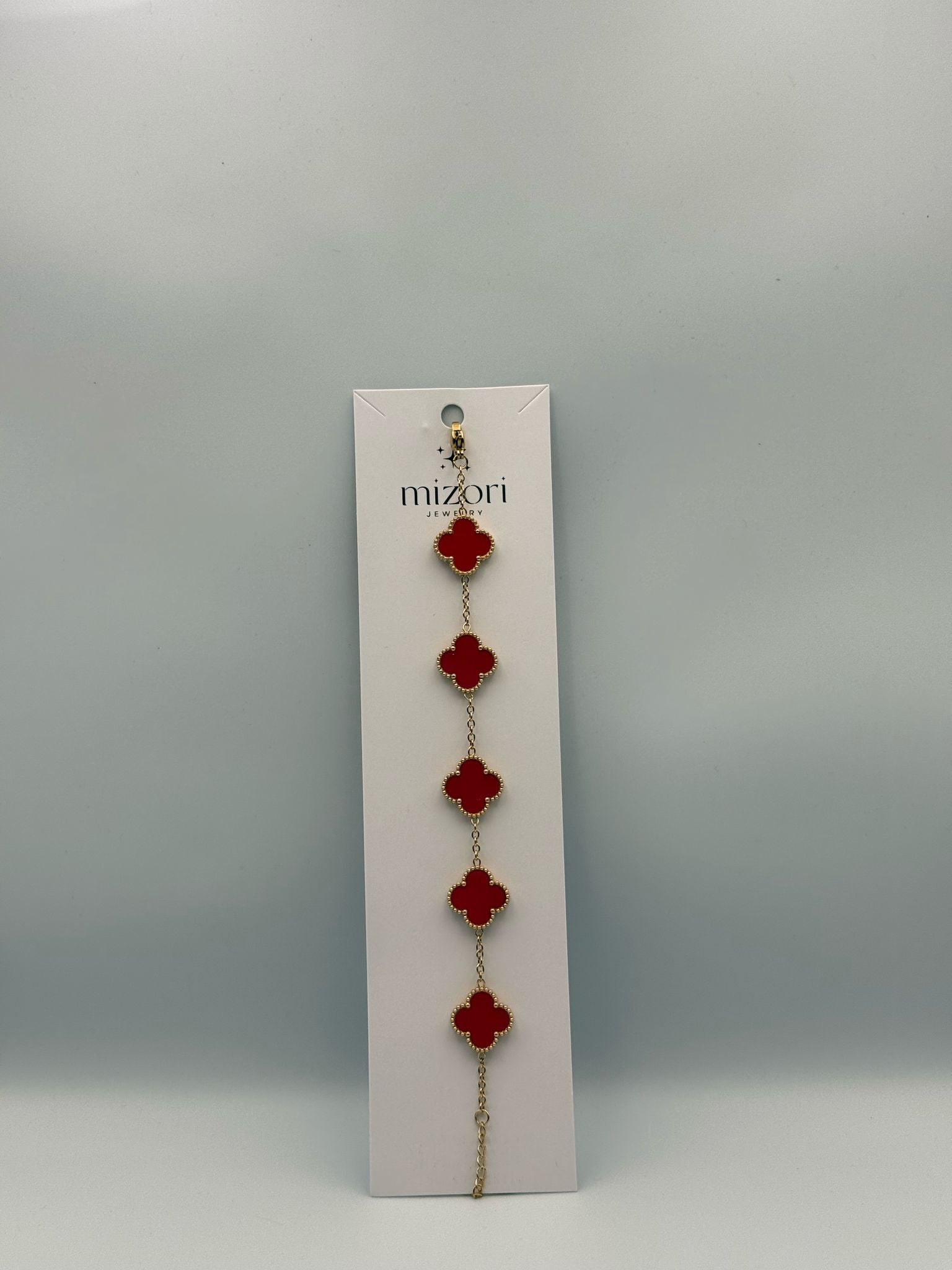 Mizori Jewelry red and gold stainless steel clover bracelet, elegant minimalist women’s fashion accessory