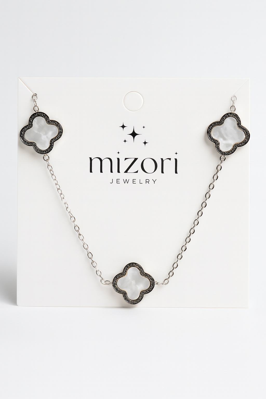 Mizori Jewelry stainless steel silver necklace with white 13mm clovers, water resistant